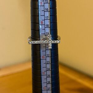 Crystal rhinestone cross ring on silver tone band size 9
